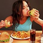 Girl eats junk food