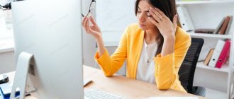 Tension headache in a woman while working at the computer